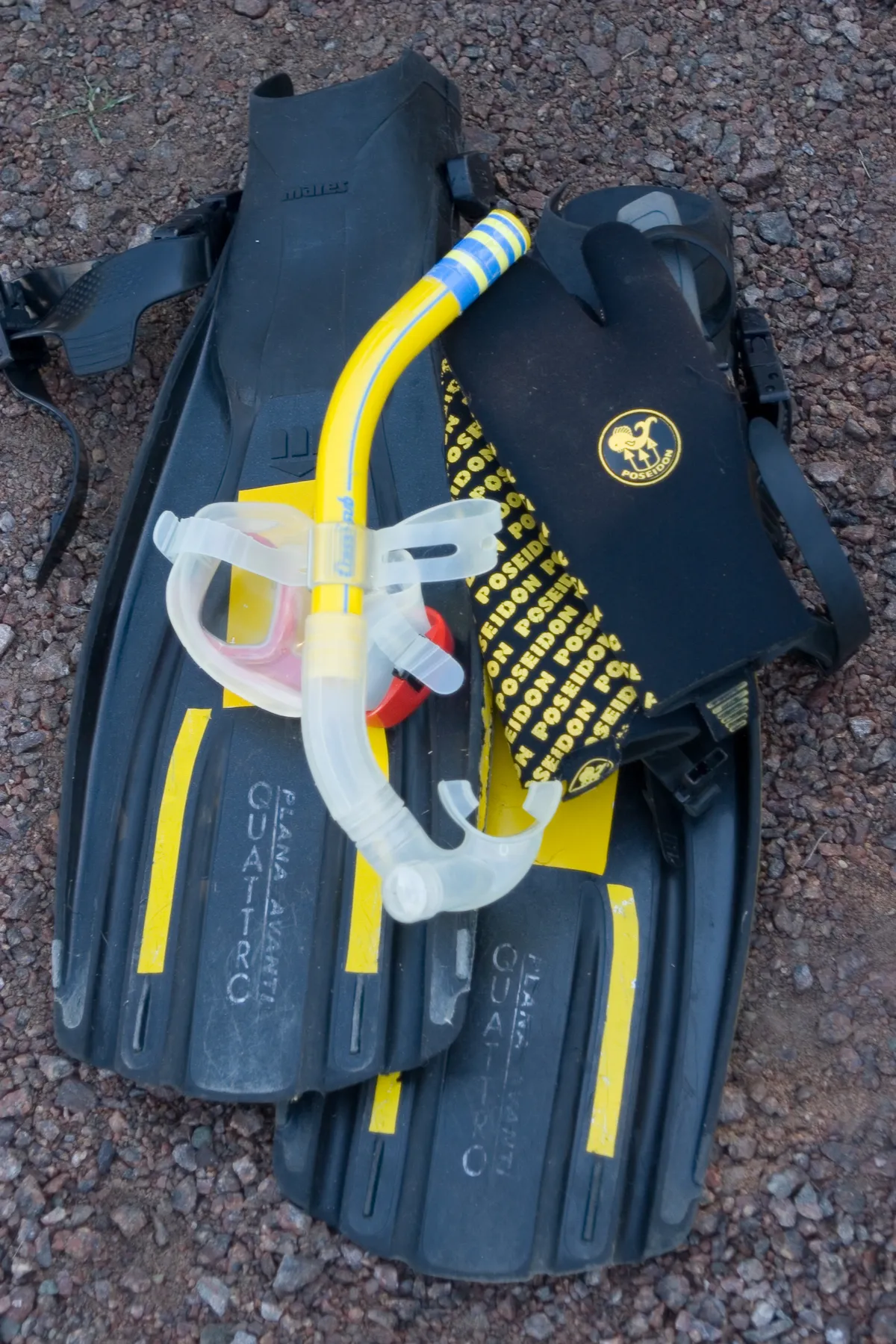 Classic snorkeling mask and snorkel kit laid out before a first trip